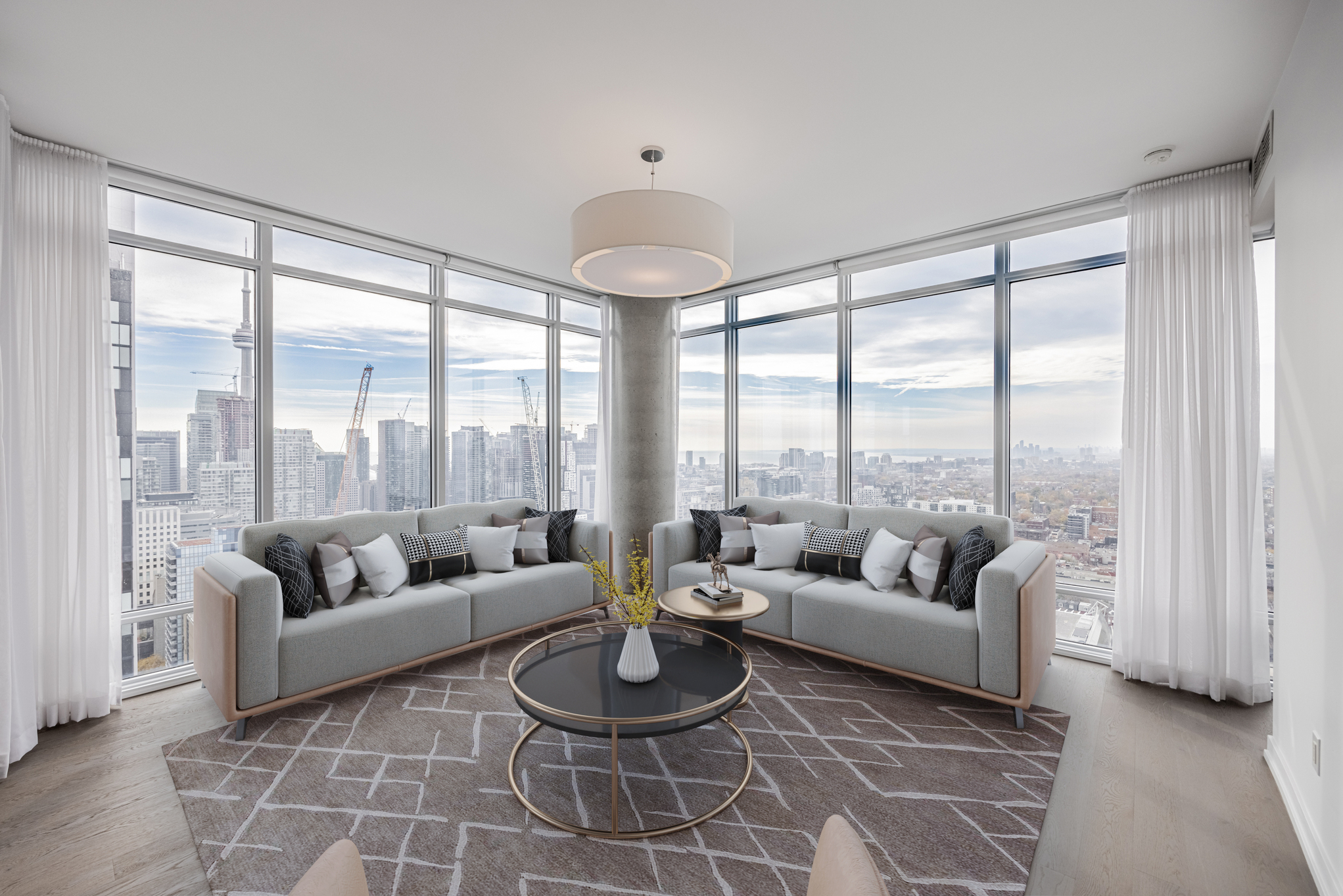 View of Toronto skyline from condo living room windows.