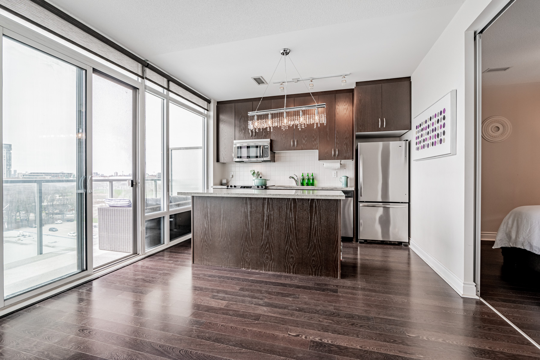 Living room dark laminate floors.