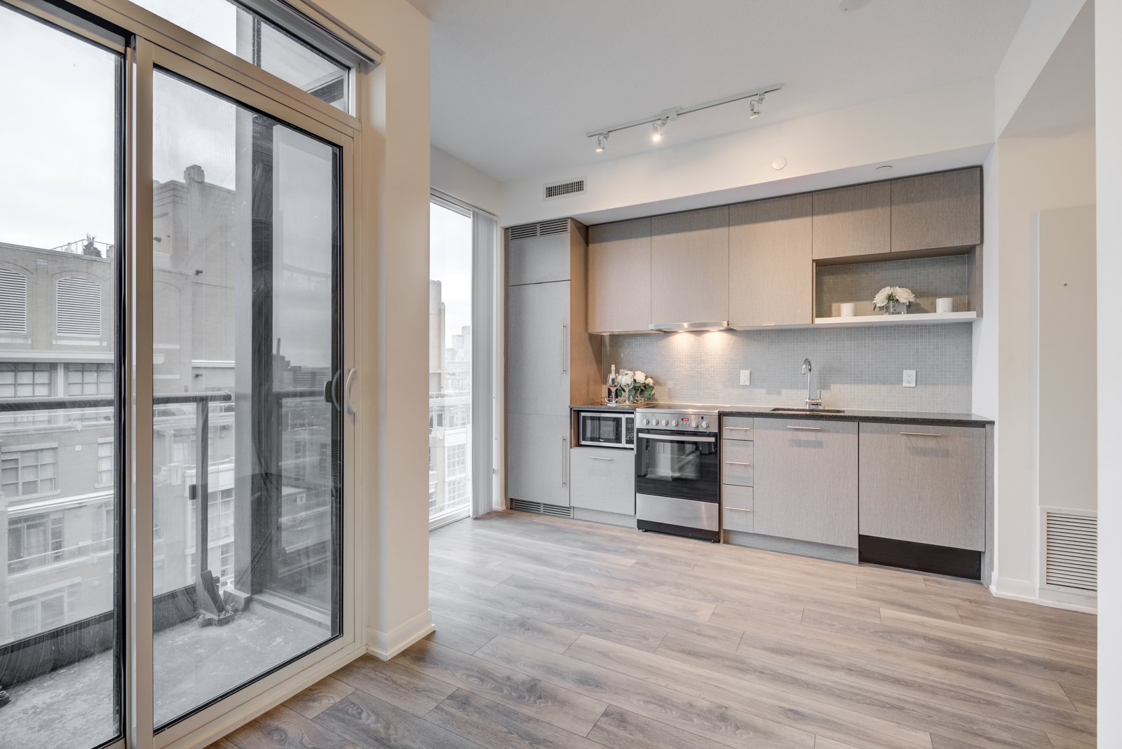 Light and dark laminate floors of the penthouse suite.