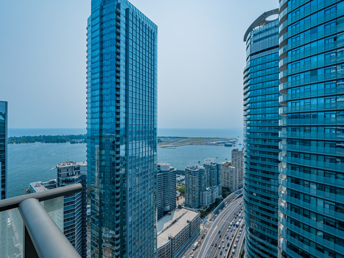 View of Lake Ontario and Centre Island from balcony of 55 Bremner Blvd Unit 4709.