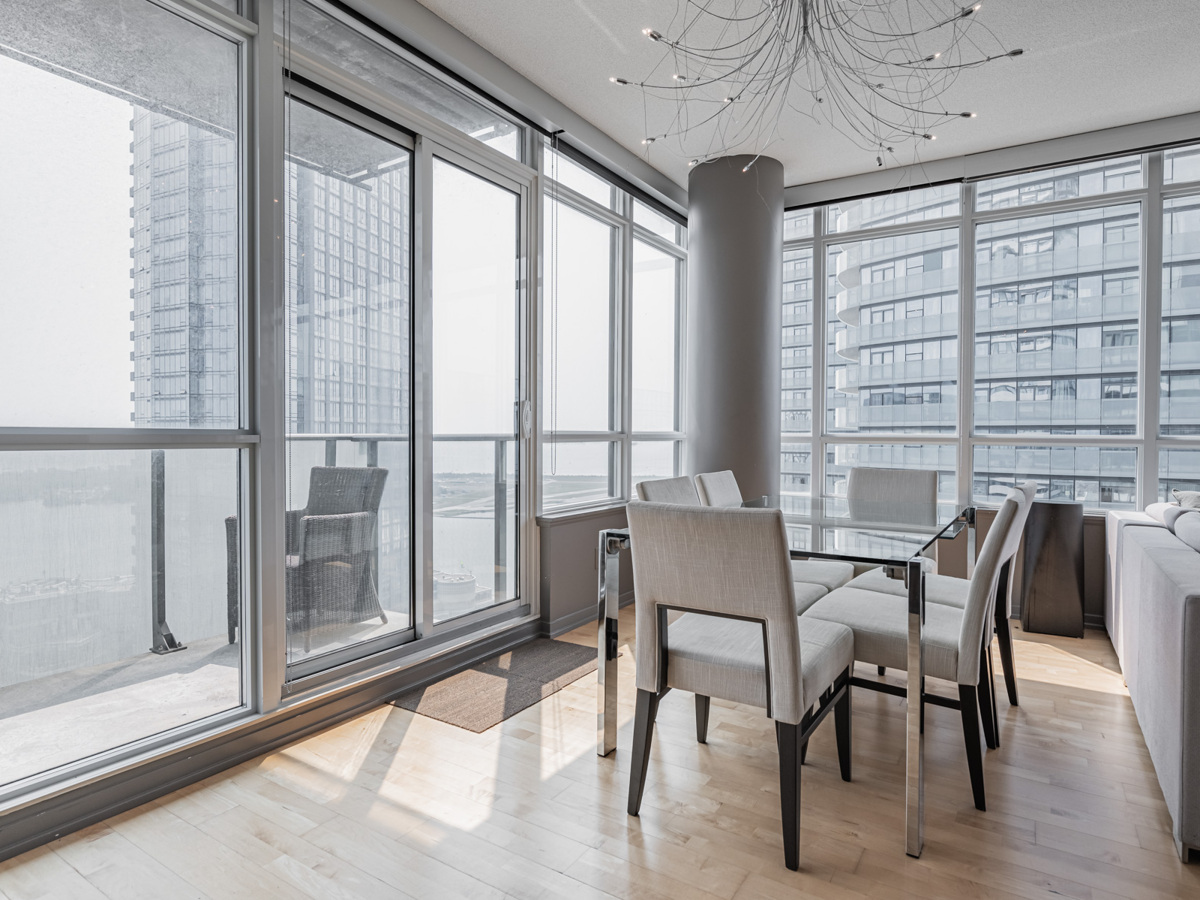 Brightly lit dining room of 55 Bremner Blvd Unit 4709.