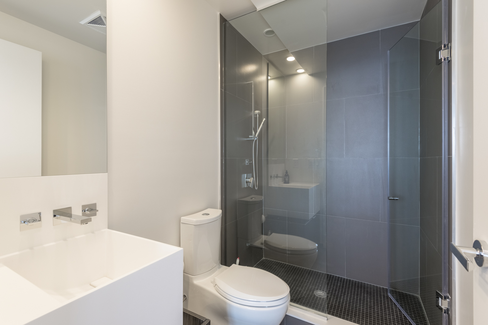 Photo showing condo bathroom with walk-in shower