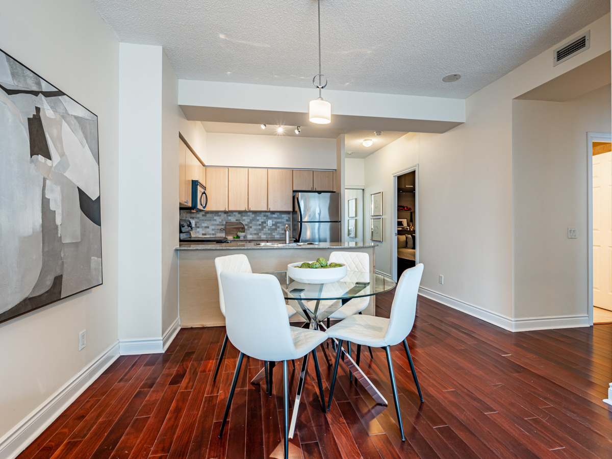 Gray walls and vivid red hardwood floors of 763 Bay St Unit 4705.