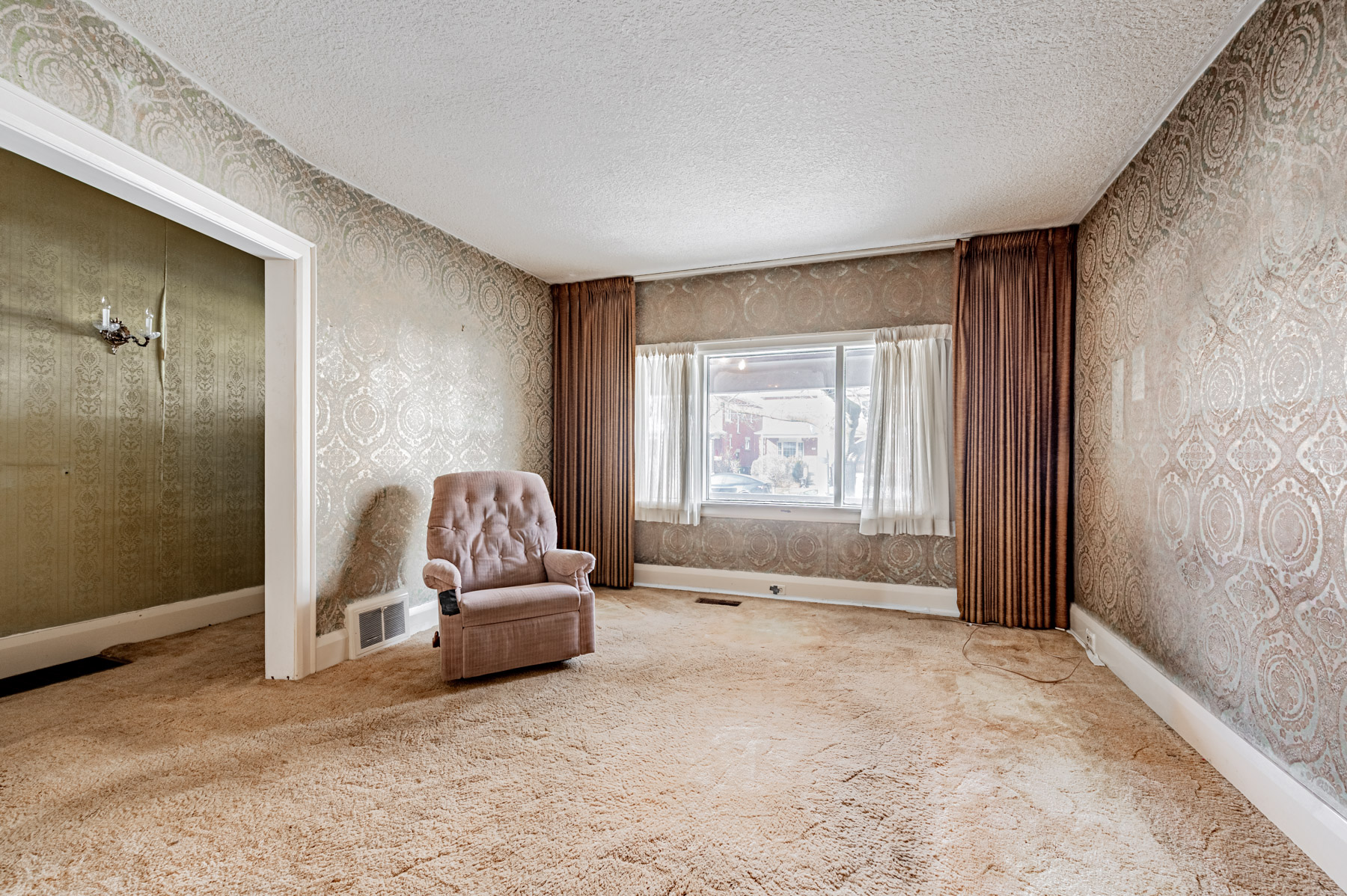 View of unfinished living and dining room – 35 Woburn Ave.