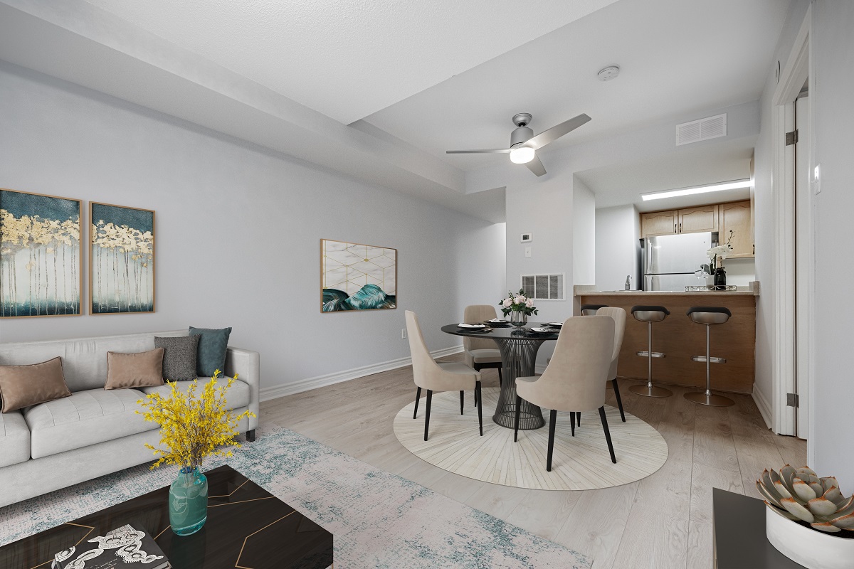 Dining room with sleek gray ceiling fan with light.