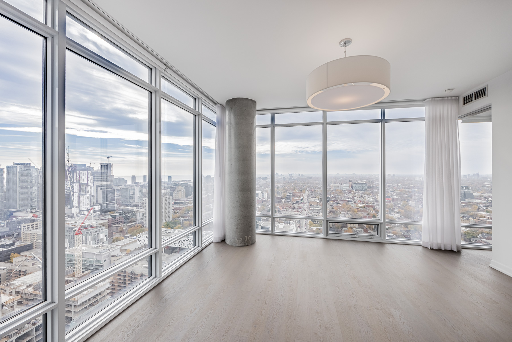 View of downtown Toronto from large windows of 488 University Ave Unit 2710.