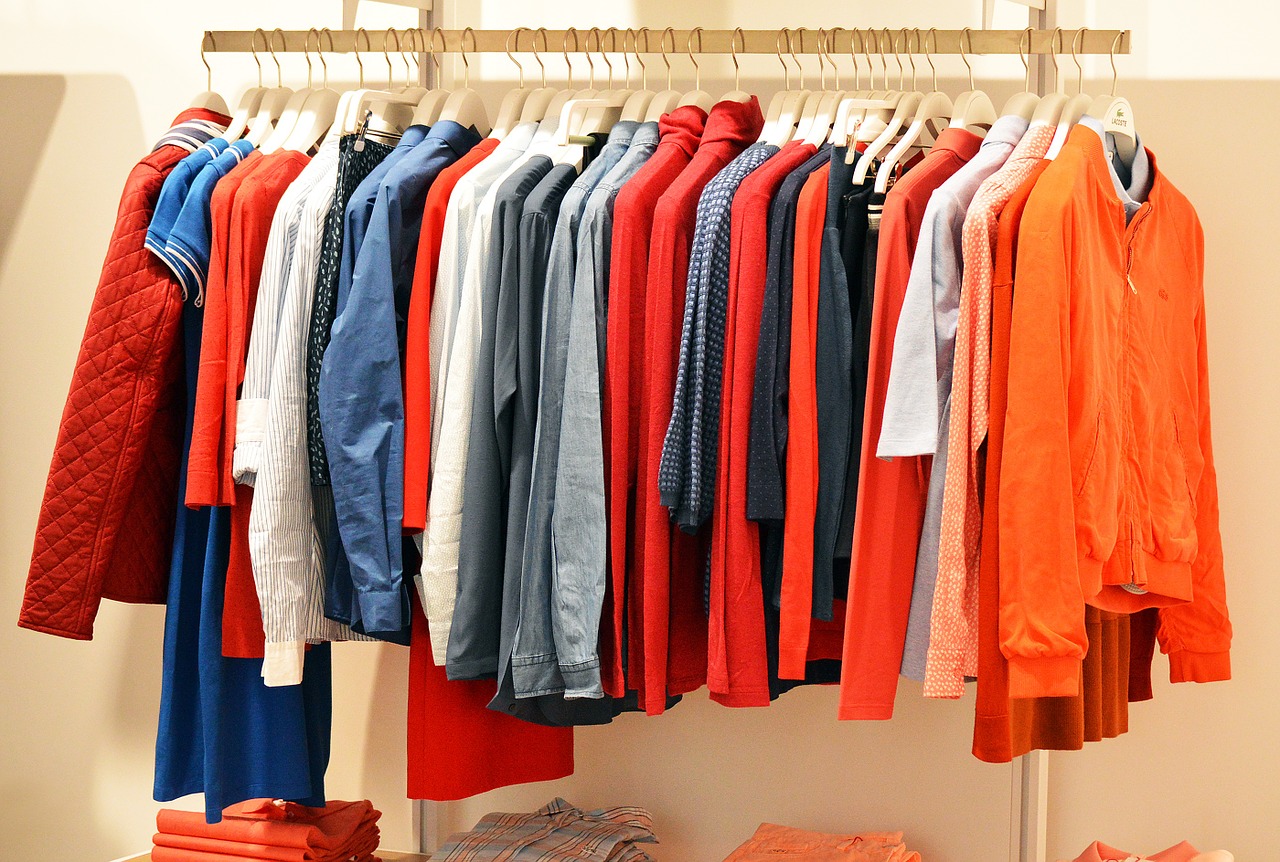 Store rack with colourful men and women's tops in a local Bathurst neighbourhood shop.