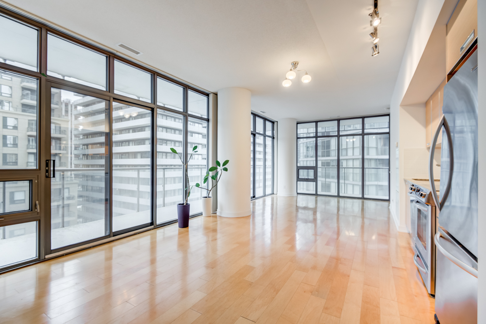 Photo of 33 Charles St E interior and its many windows. And as a result, hence, consequently, therefore, in conclusion seems like, maybe, probably, almost most of all, most noteworthy, especially relevant.