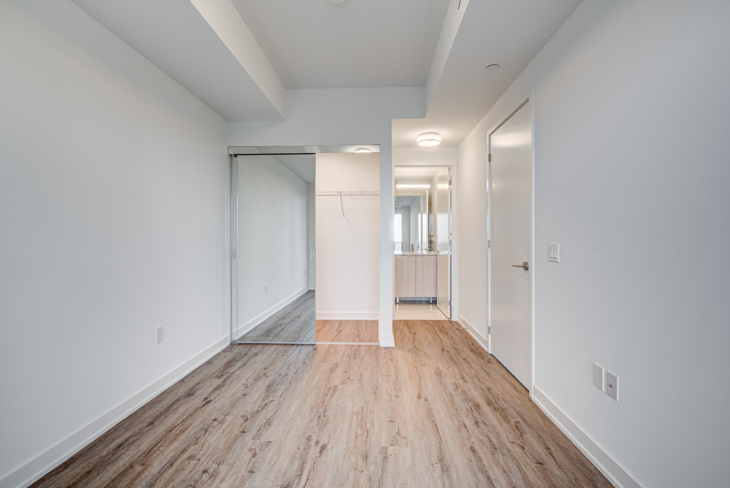 15 Queens Quay E Unit 1901 master bedroom with split layout.
