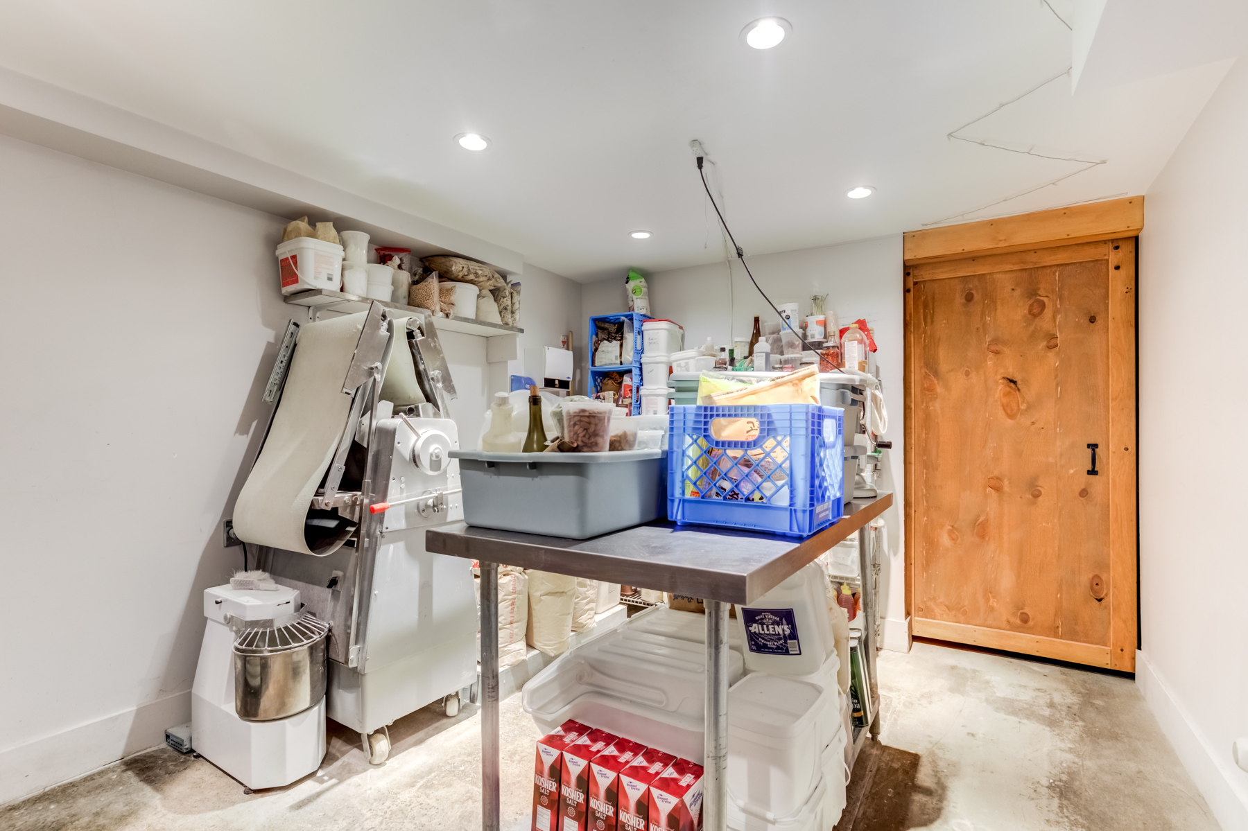 Basement storage room with food items.