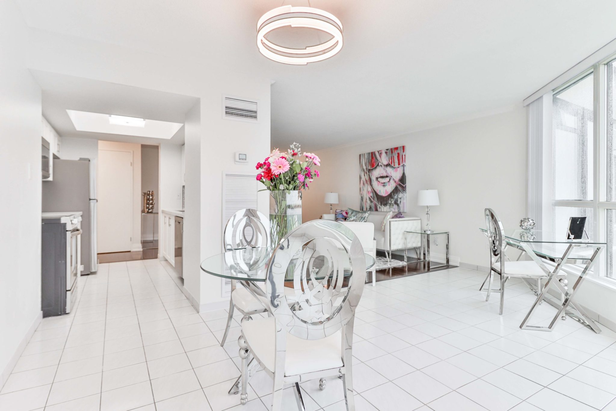 5 Rowntree Rd condo kitchen and dining area with white ceramic tiles.