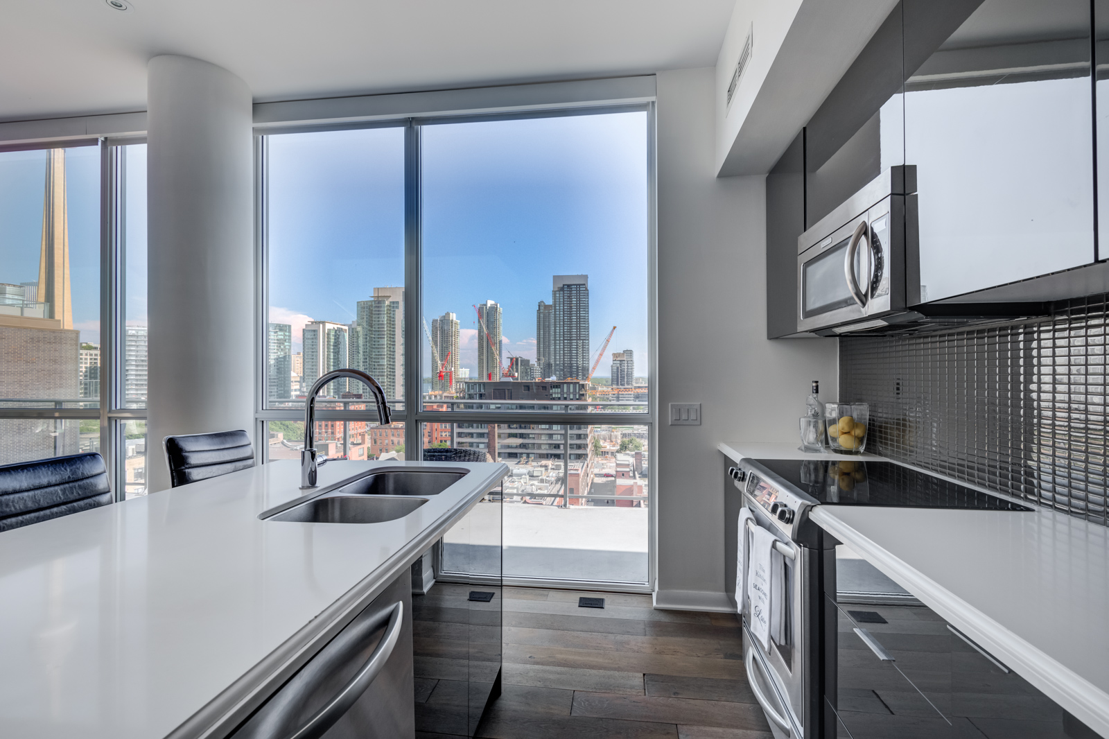 View of Toronto from kitchen windows of Victory Lofts Penthouse Suite in 478 King St.