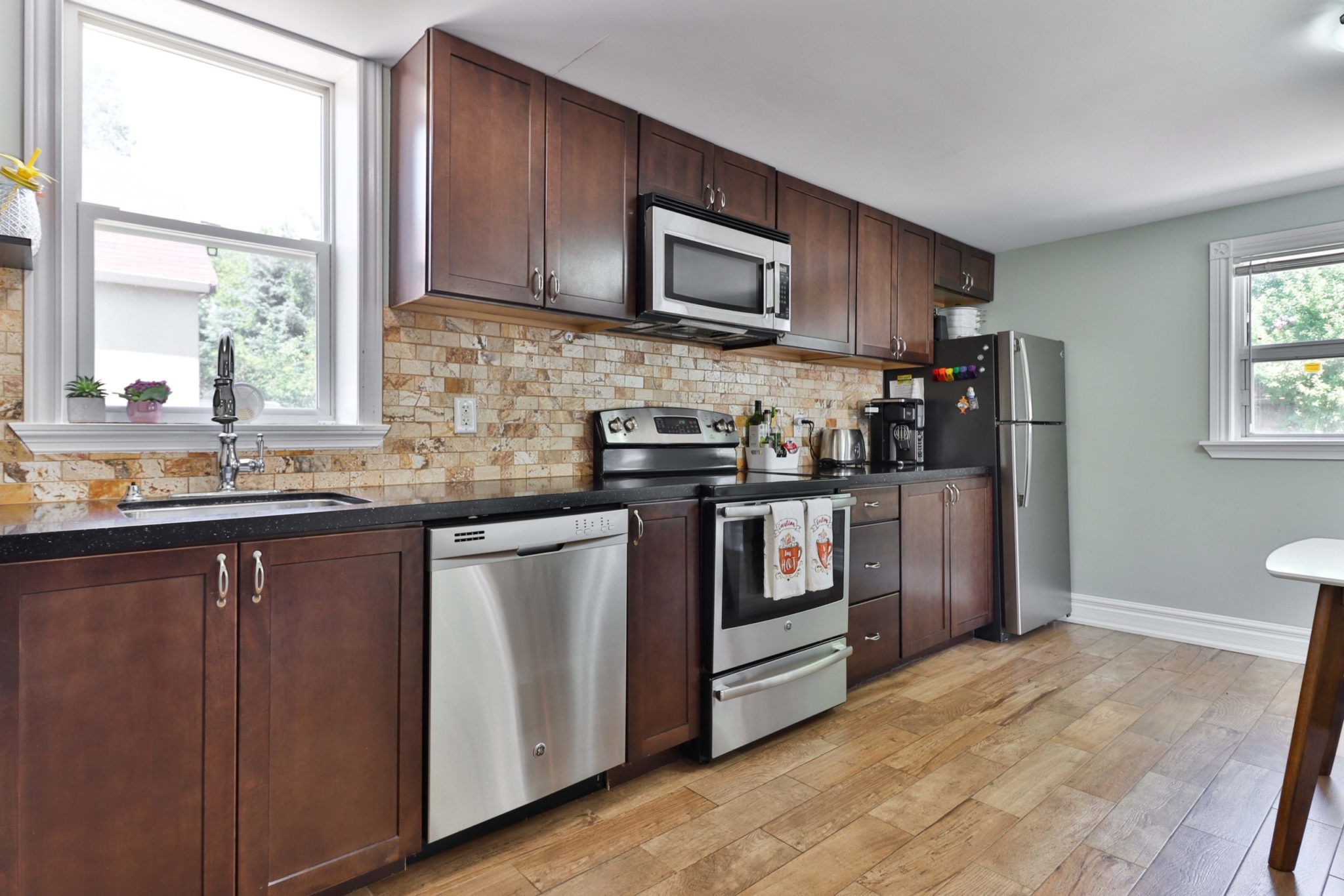 Large kitchen of 117 Phillip Ave with lots of drawers, cabinets and cupboards.