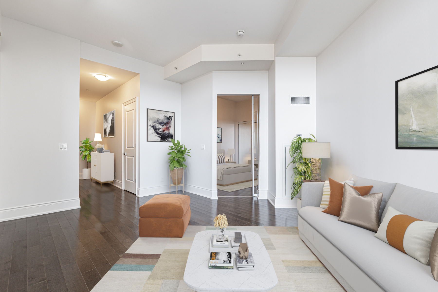 Newly painted condo living area with gray walls and dark hardwood floors.