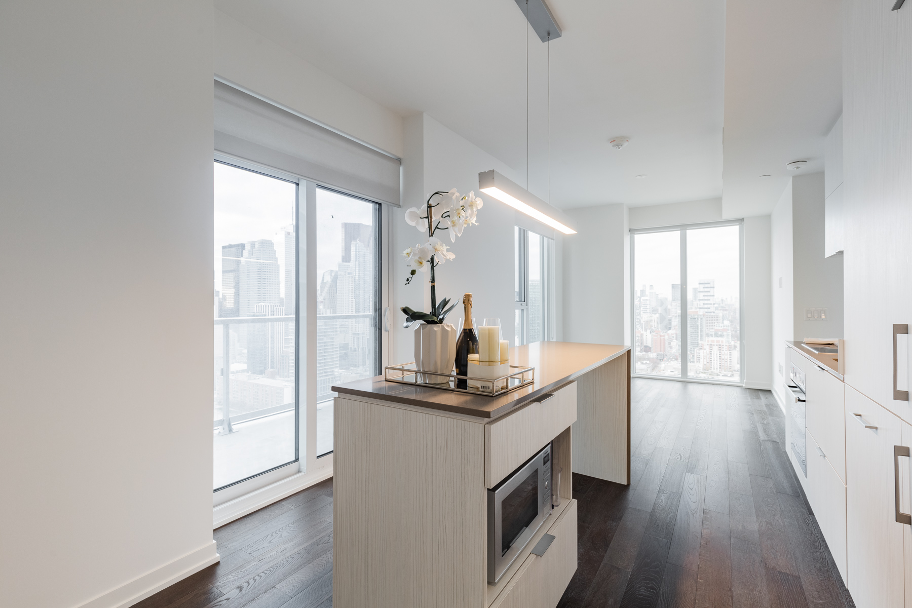 Quartz island with modern light-fixture – 20 Richardson St Suite 3108.