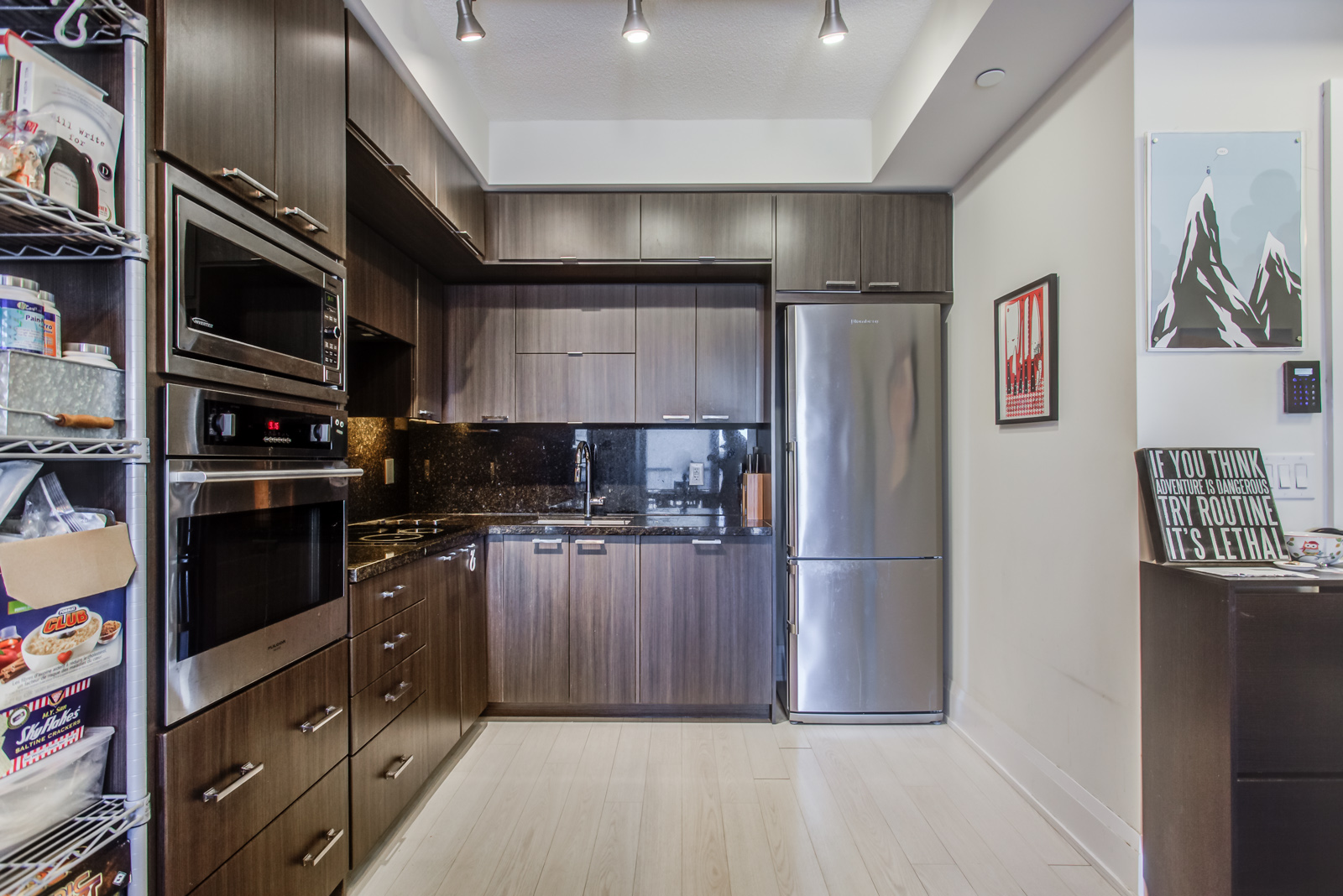 Another angle of 120 Harrison Garden Unit 1025 kitchen.