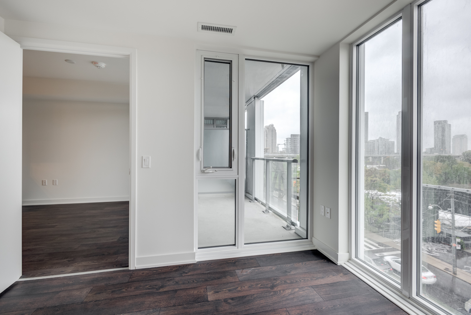 Master bedroom window and balcony overlooking Bathurst St.