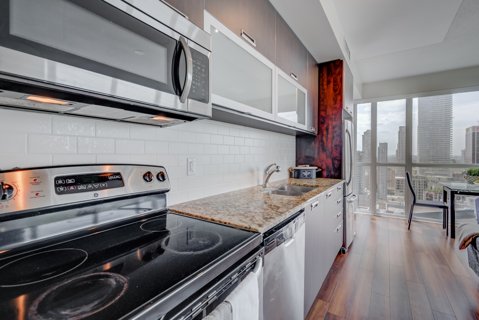 Close up of 28 Ted Rogers Way Unit 3609 kitchen counters and appliances.