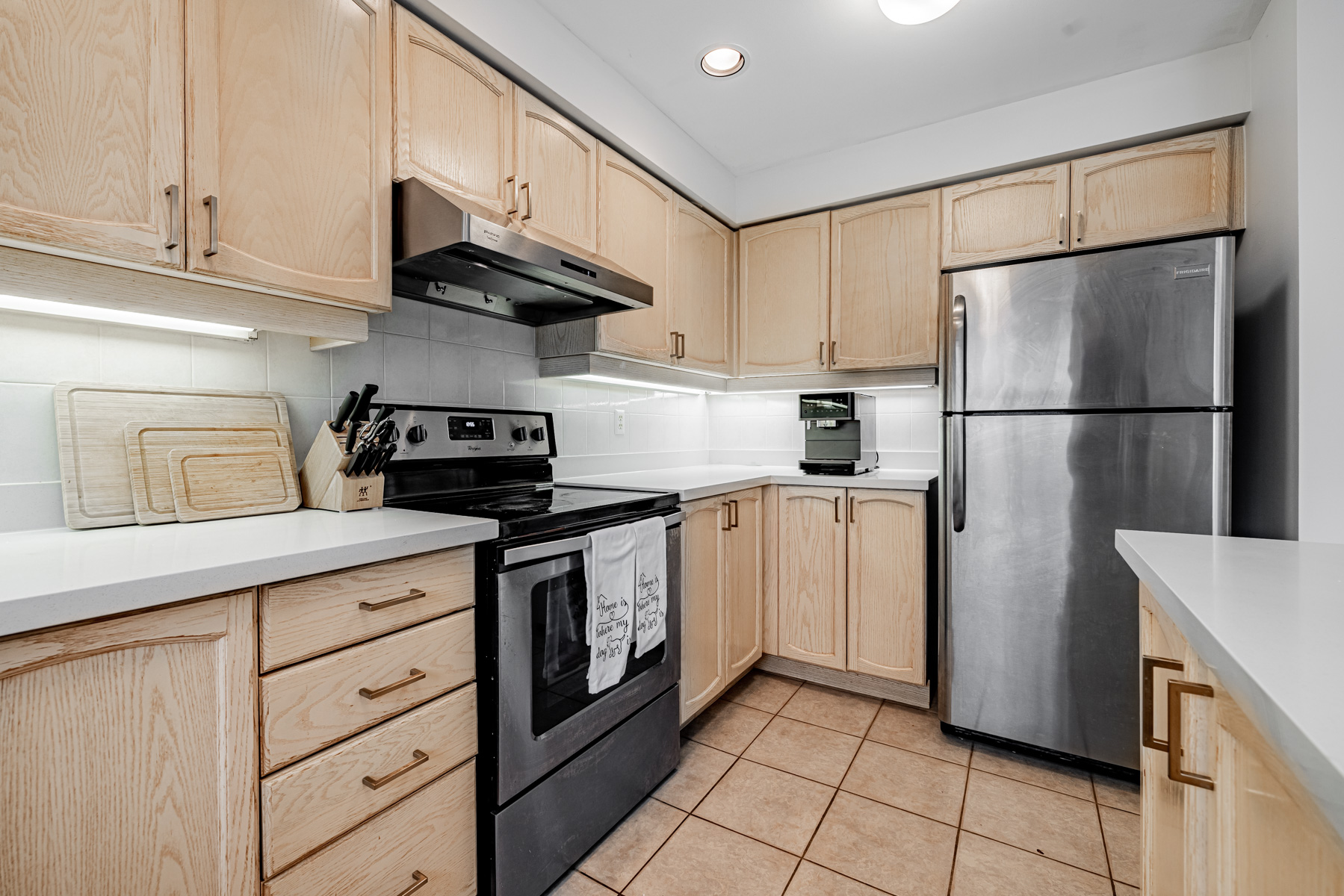 Kitchen with under-cabinet tube lights.