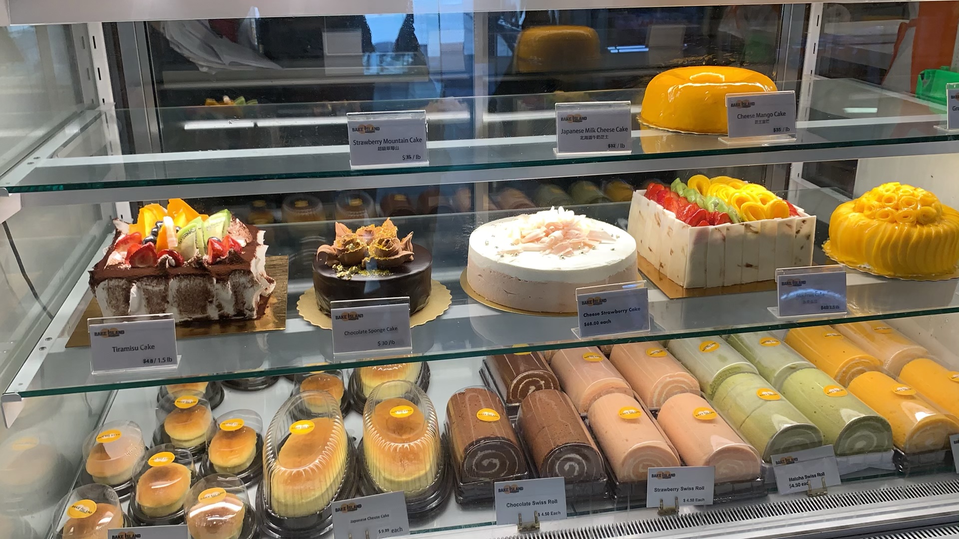 Store display with colourful desserts at Bake Island in Yonge and Dundas.