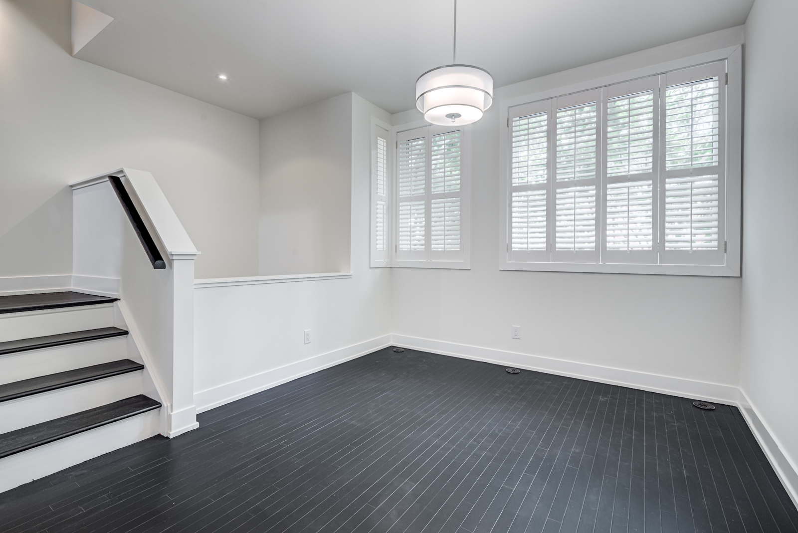 Empty dining room of 12A Cecil condo townhouse.