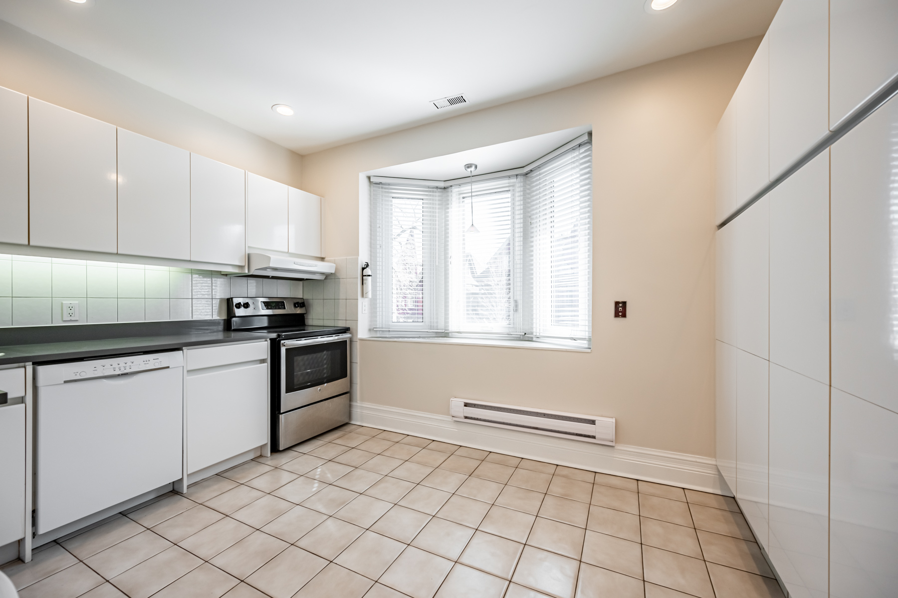 Kitchen with bay windows.