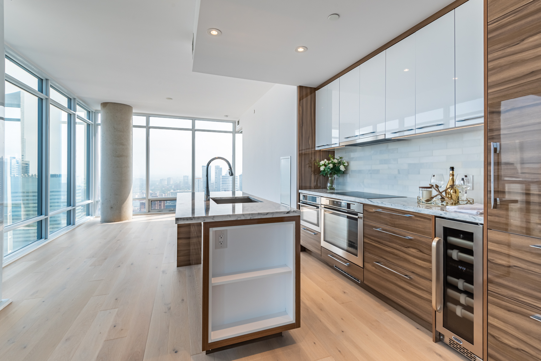 488 University Ave kitchen island with side storage and outlets.