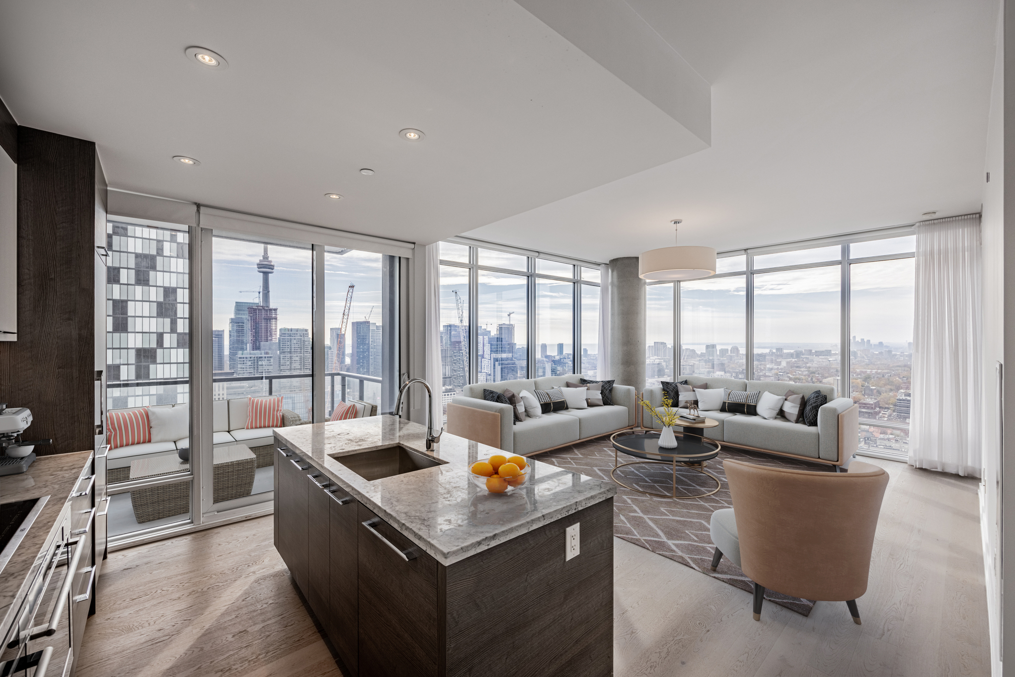 View of Toronto and CN Tower from 488 University Ave Unit 2710 kitchen windows.