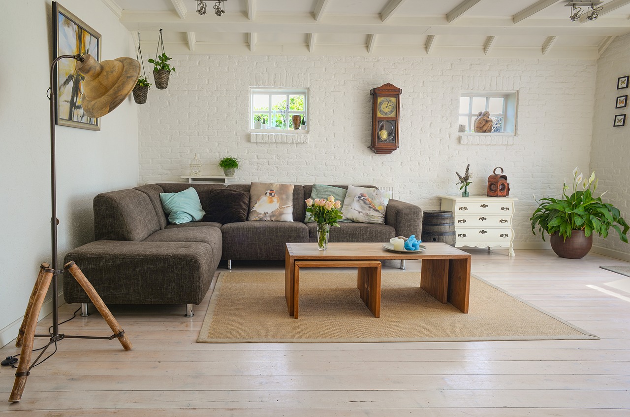 Gorgeous professionaly staged home with sofa and tables and decor.