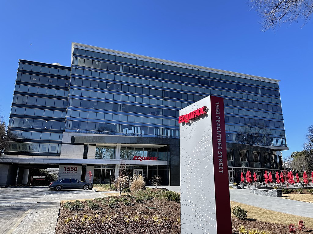 Exterior of Equifax HQ with company name.