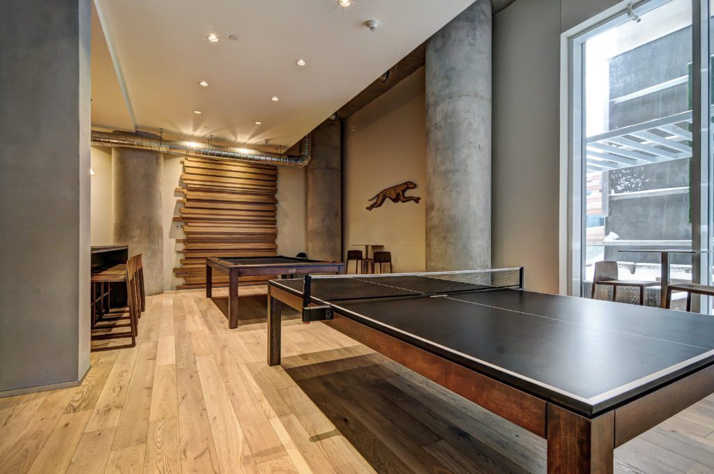 Karma Condos rec room with ping pong tables.