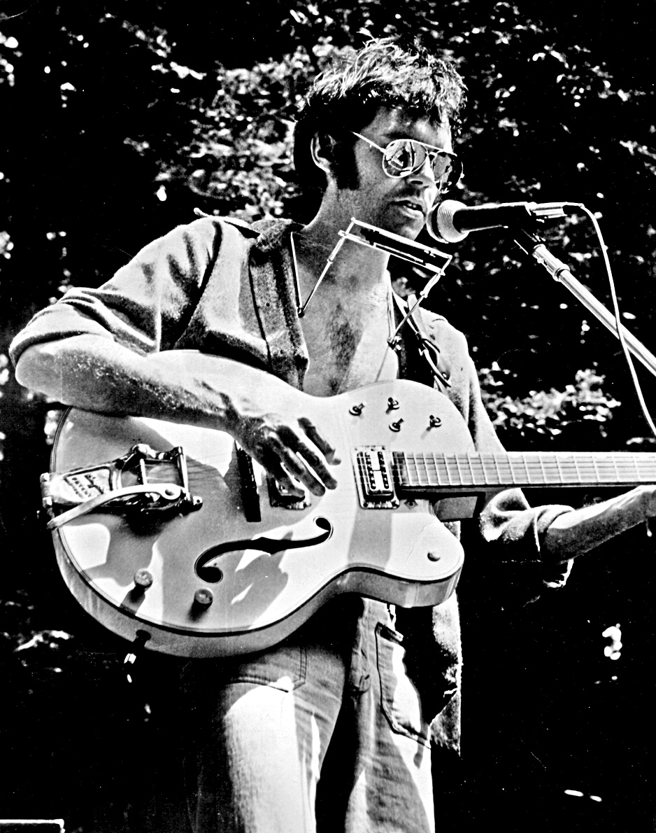 Black and white photo of Neil Young.