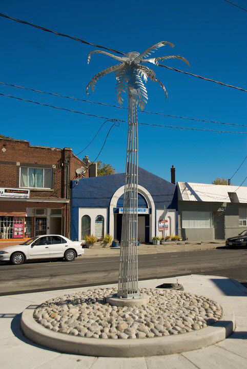 Photo of famous steel palm tree. It stands rather tall at 16 feet.