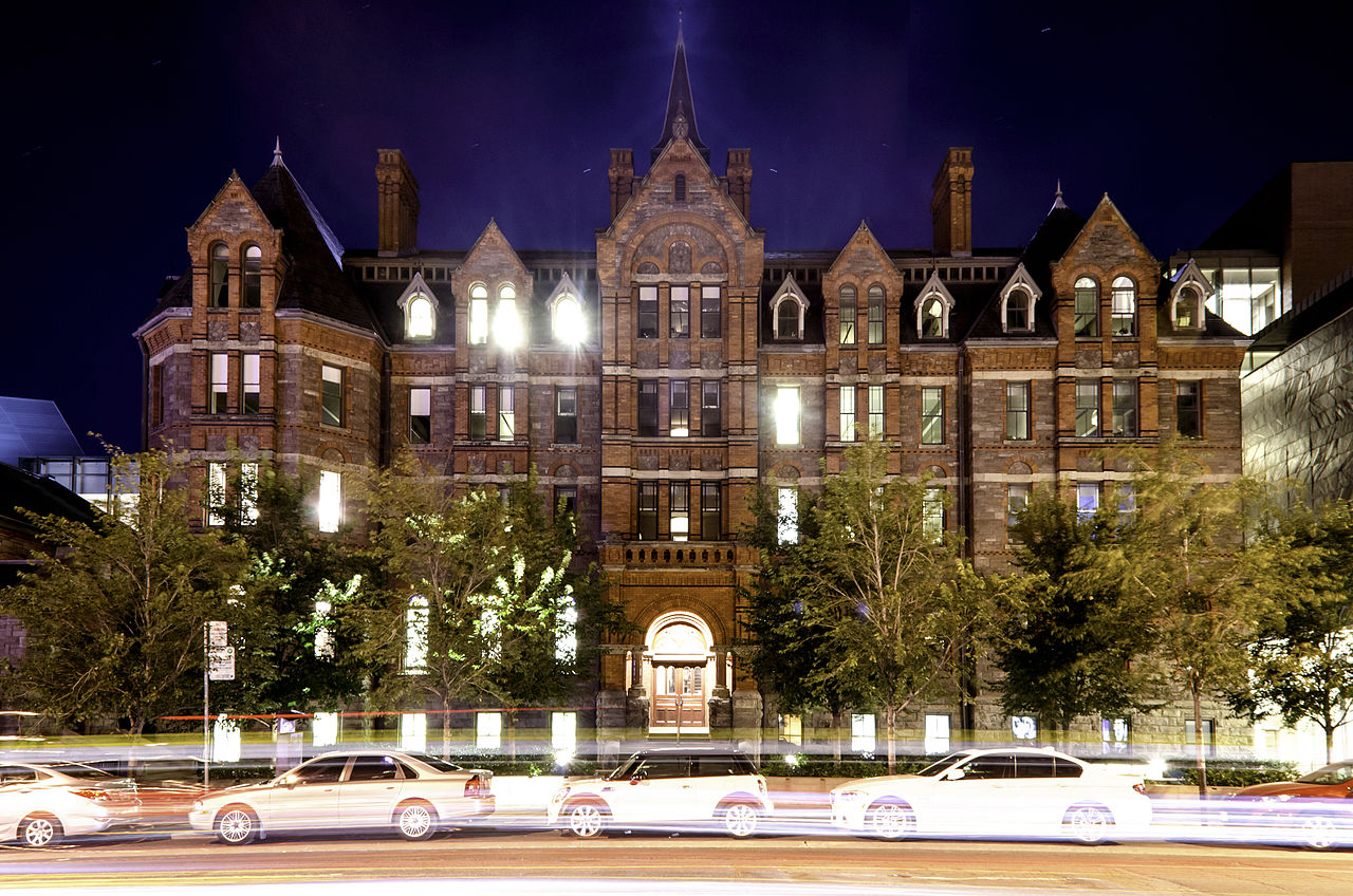 Here we see the Royal Conservatory of Music in Yorkville. There's so many lights and the cars almost create a blur. 