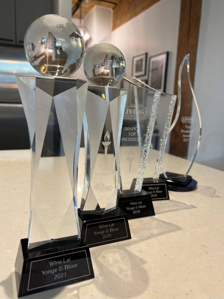 Photo of 5 Top Producer real estate trophies,