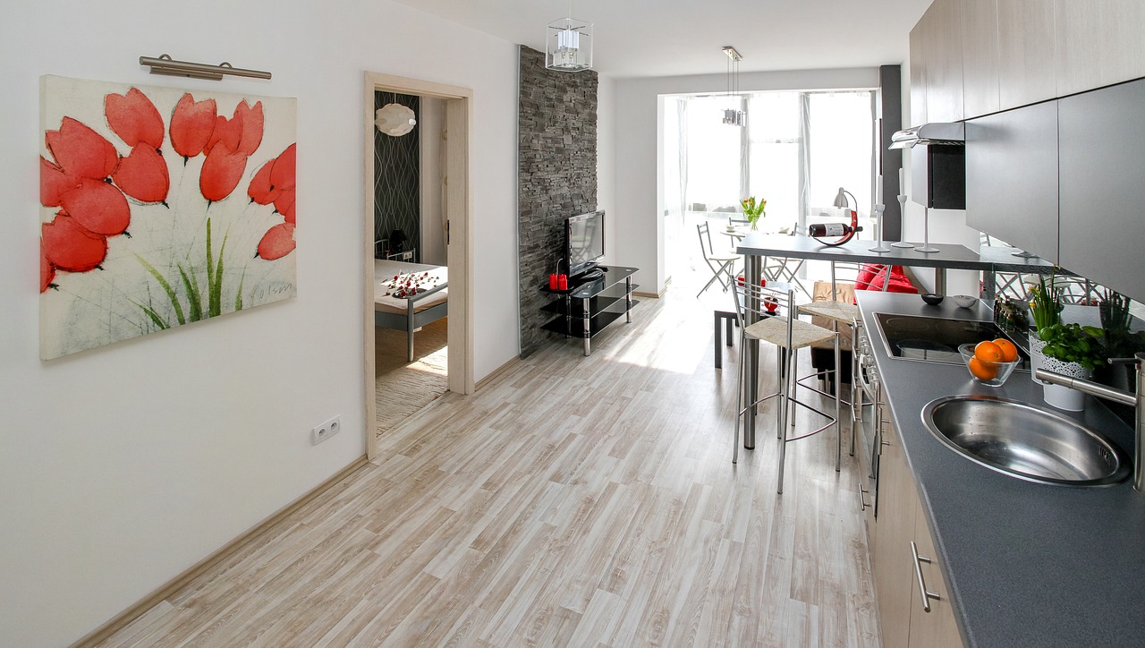 Condo kitchen and dining room with plenty of light; shows importance of presentation to selling in winter housing market.