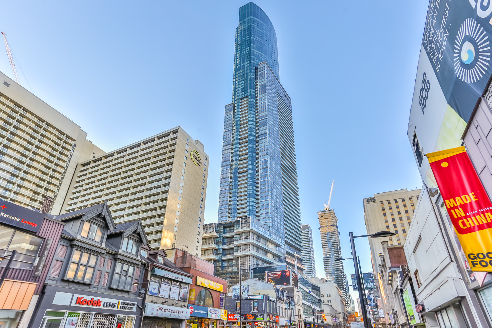 Long distance shot of Aura Condos in Toronto.