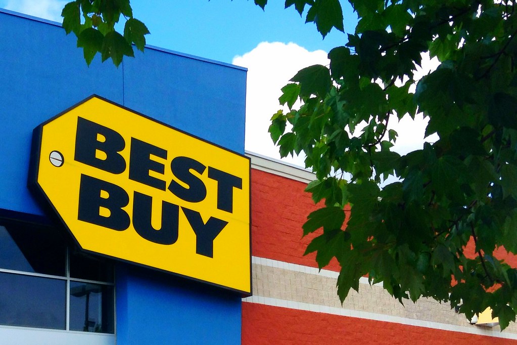 Close up of Best Buy logo on store exterior.