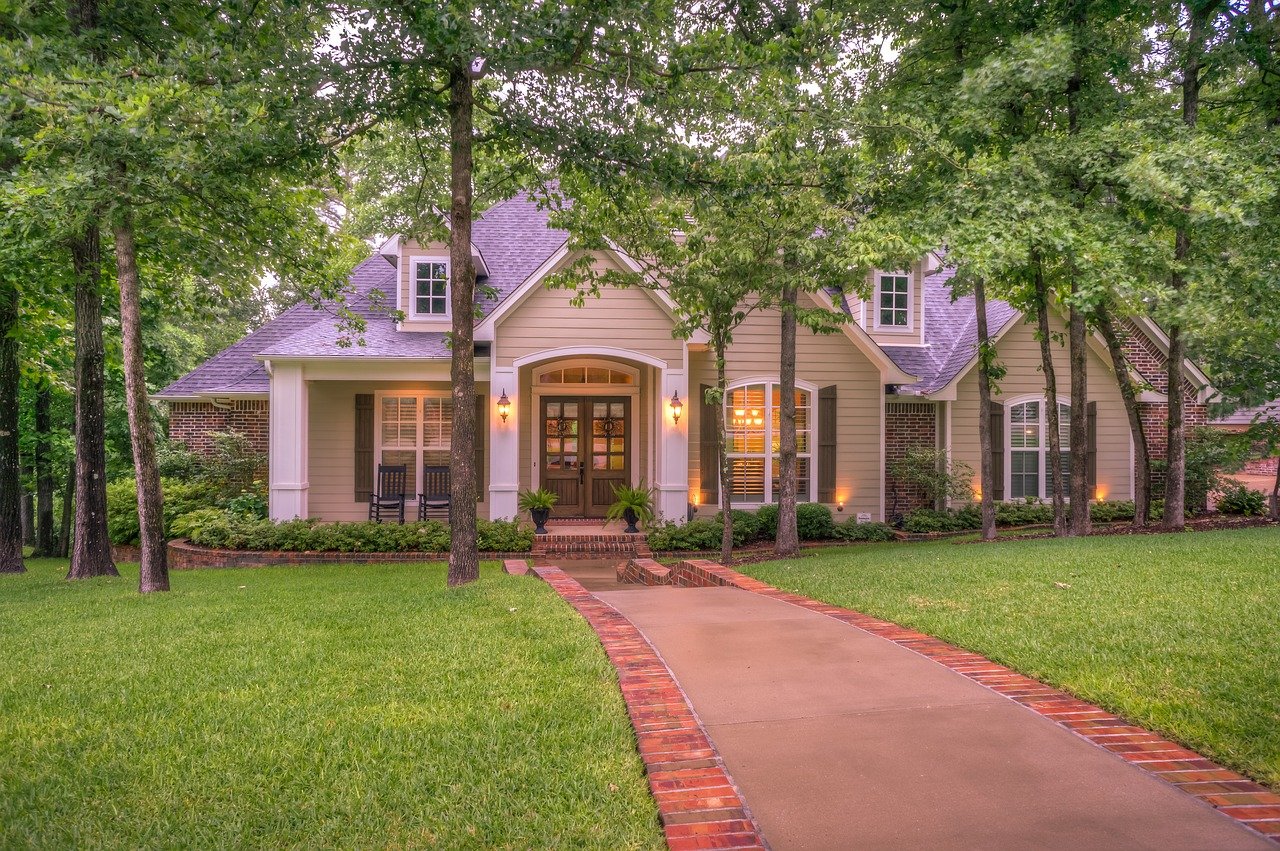 House with neatly manicured lawn.