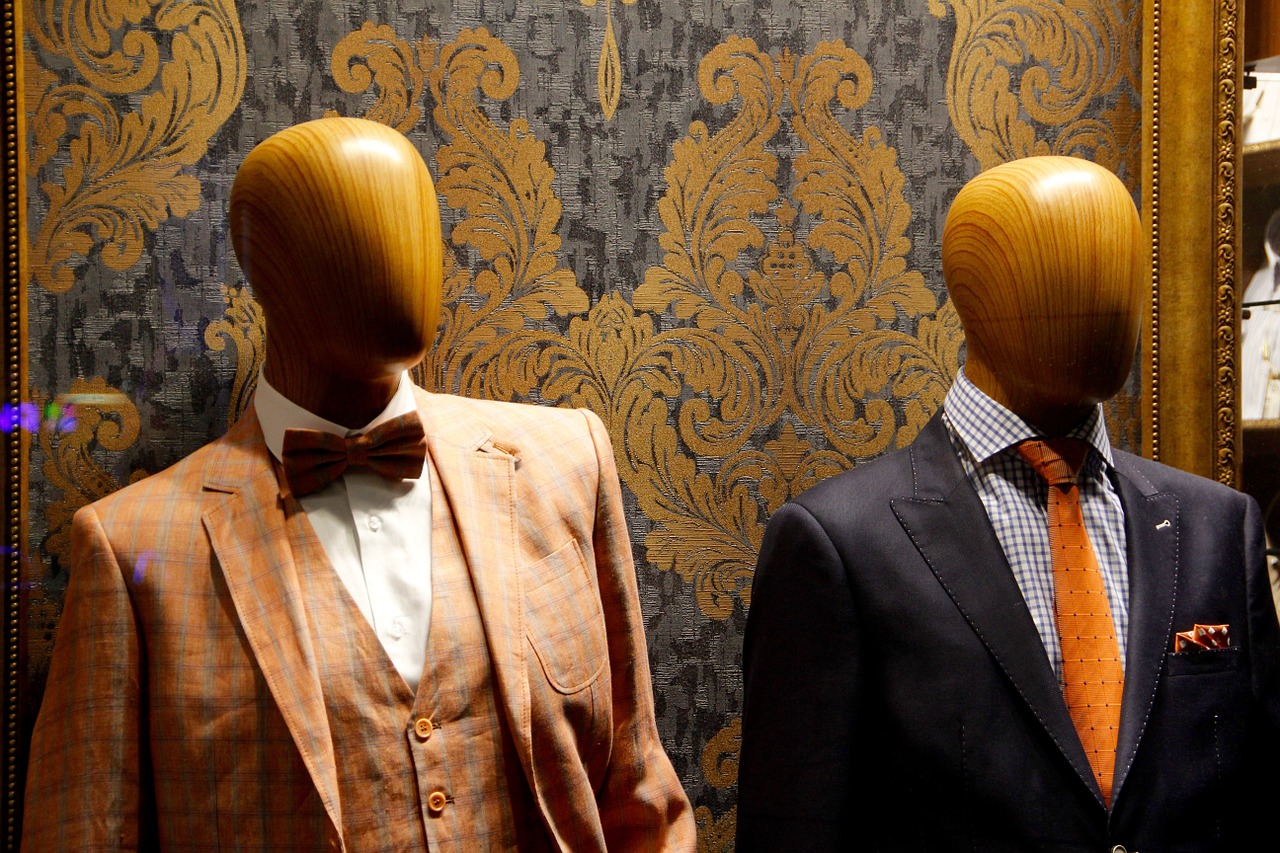 Male mannequins in fancy suits on King West.