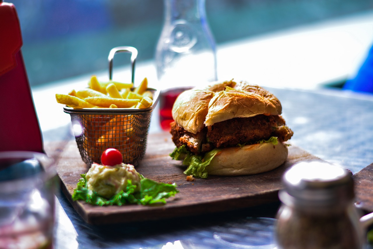 Image of burger and fries and drink.