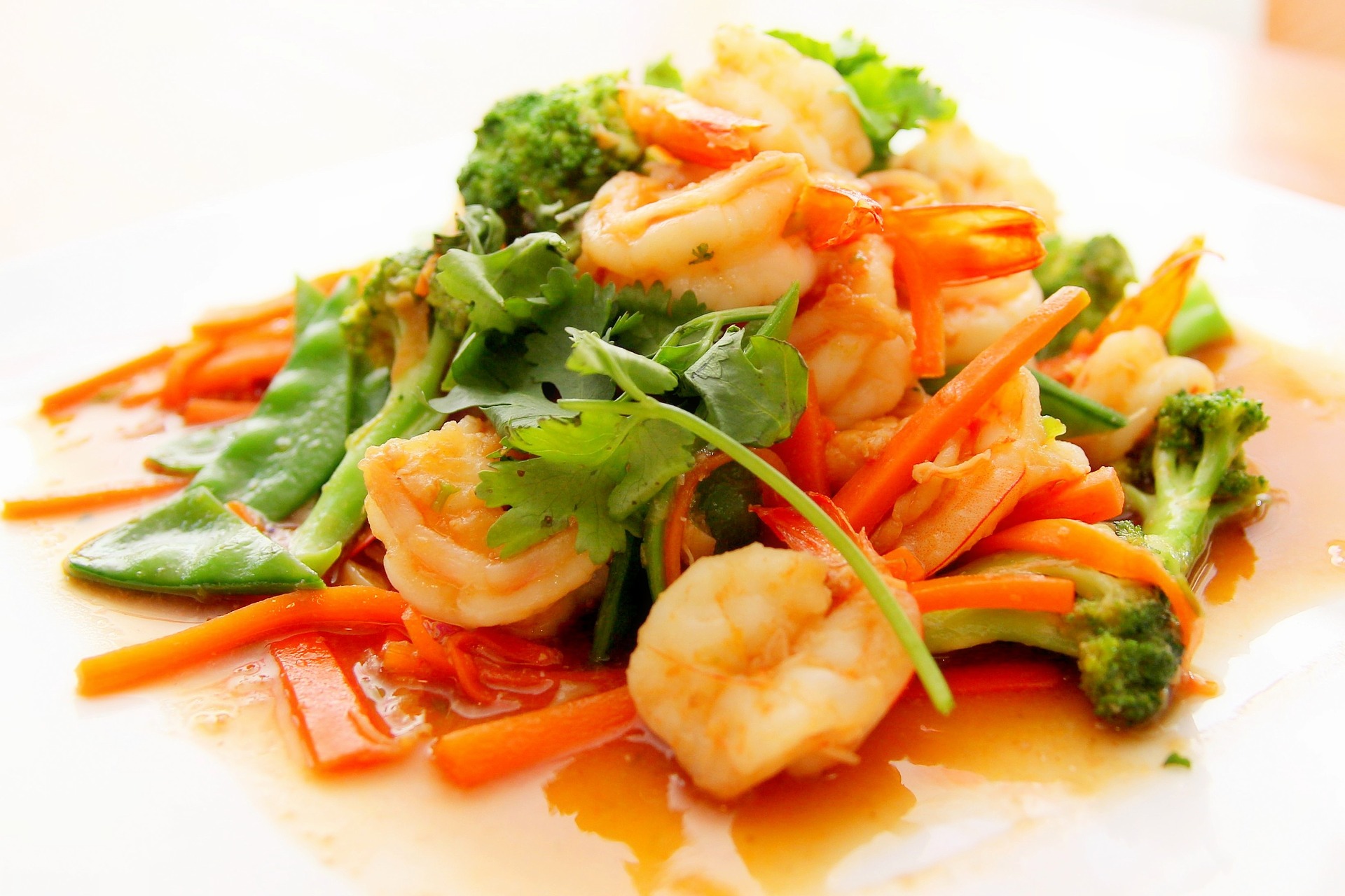 Photo of beautiful plate of food, including shrimp, vegetables and toronto real estate agent.