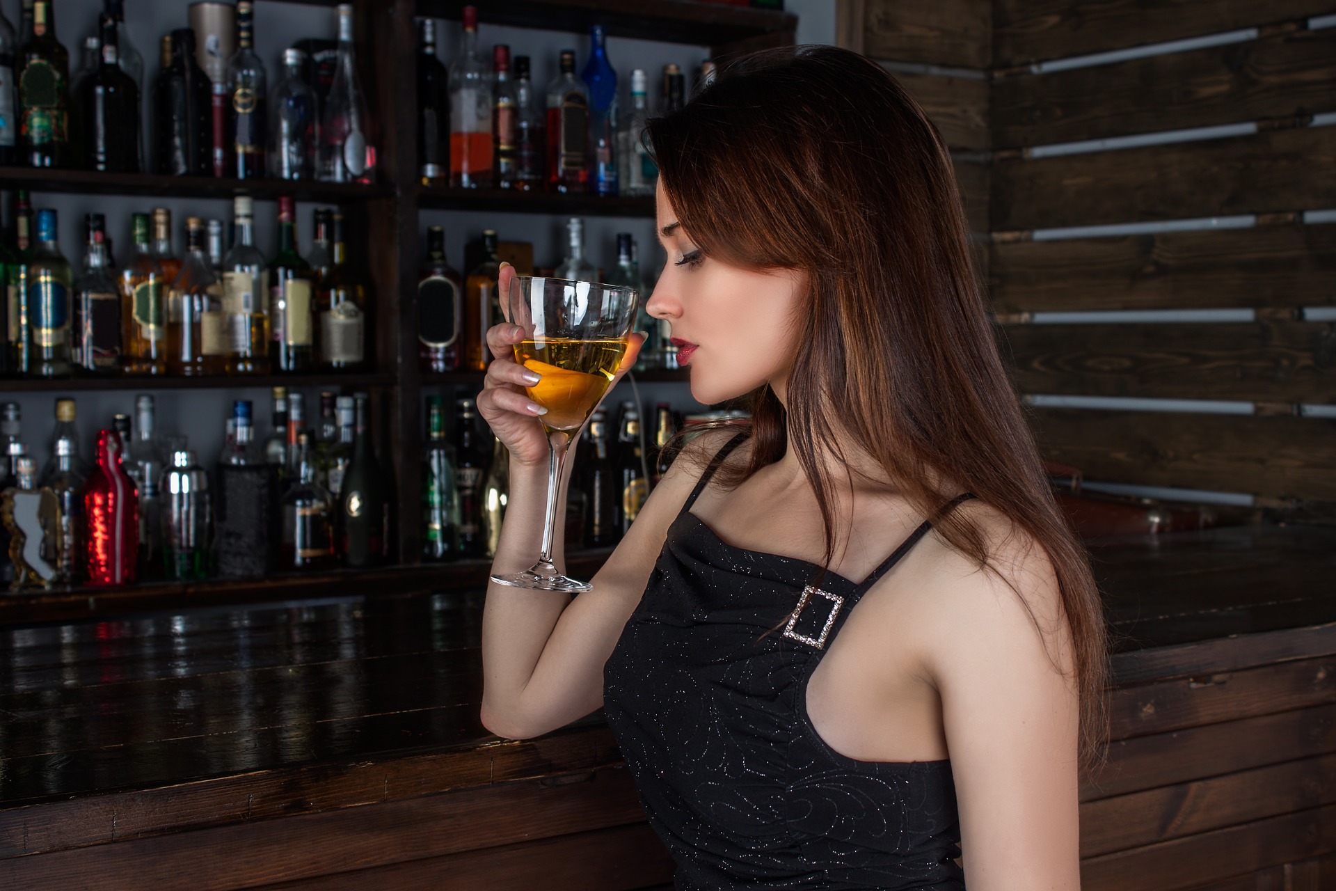 Image of woman drinking wine