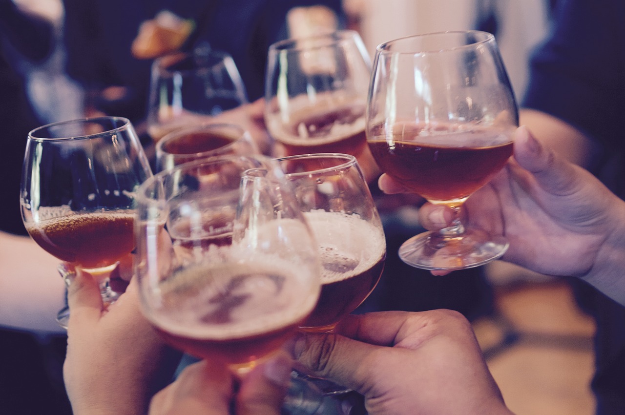 Photo of wine glasses and hands