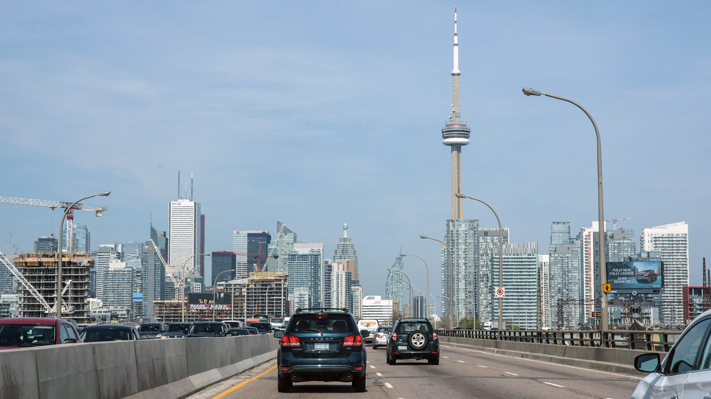 Highway shot with Toronto skyline showing September 2022 buyer's market.