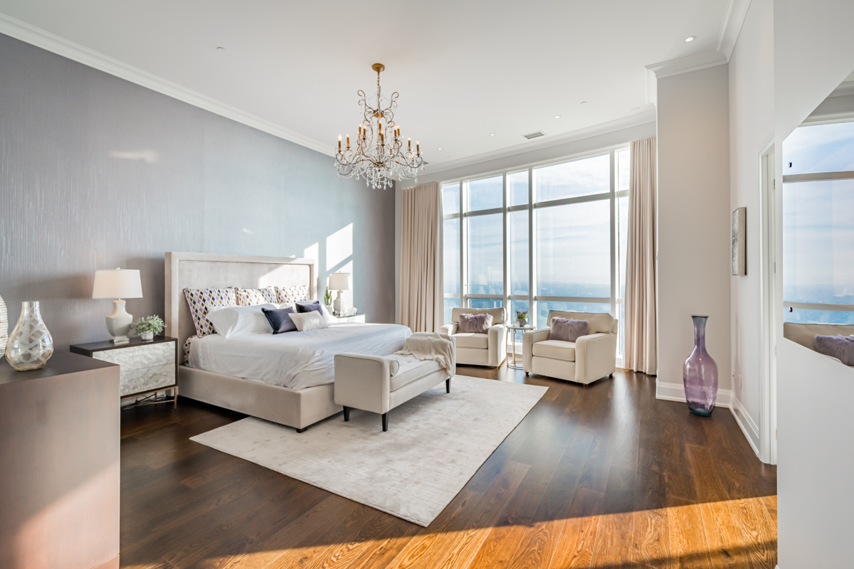 Naturally lit condo bedroom.