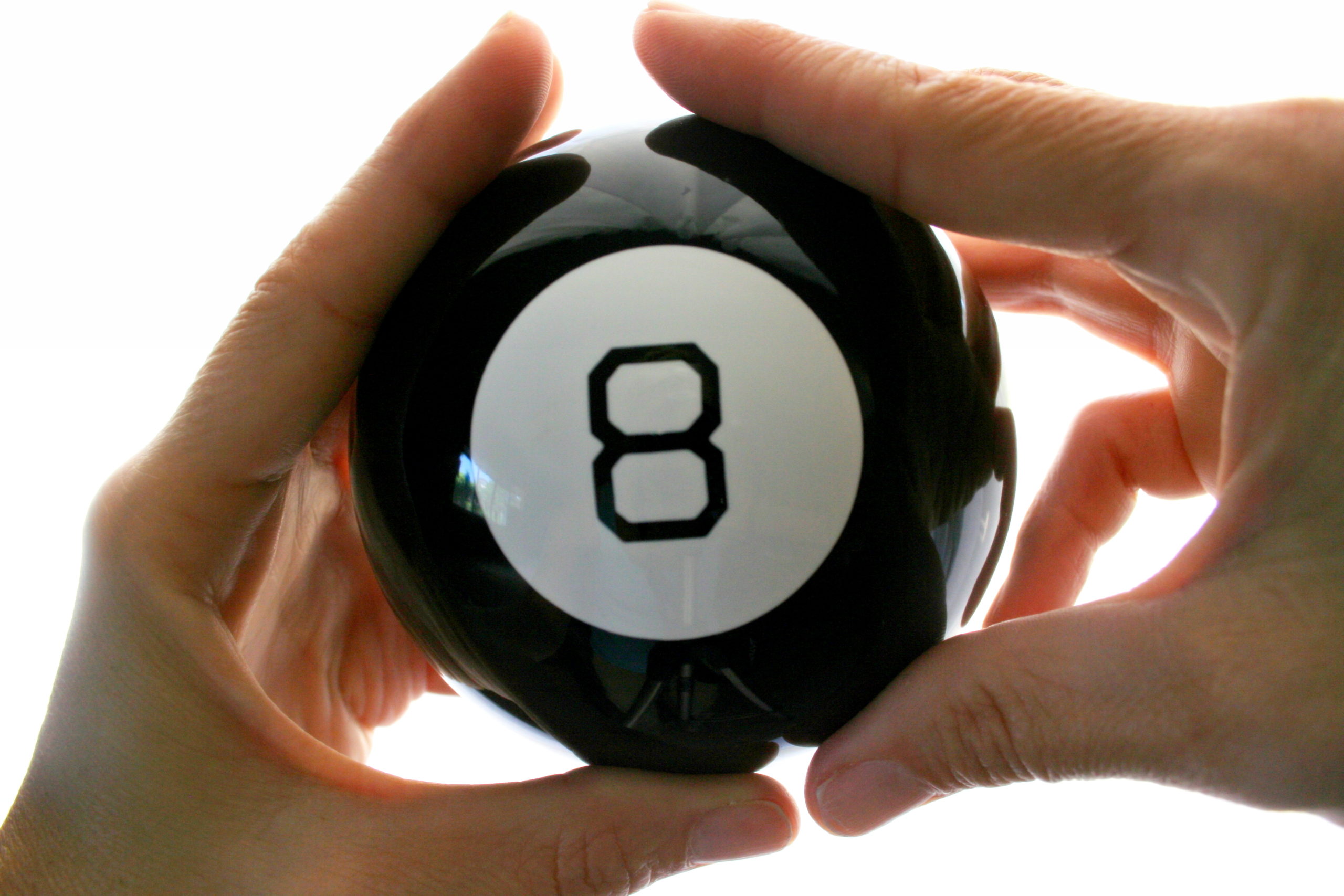 Magic 8 ball showing unpredictability of 2022 housing market.