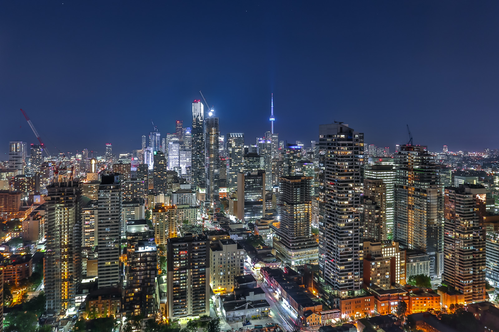 Church-Yonge Corridor at night and city lights. and, first of all, also, another, furthermore, finally, in addition