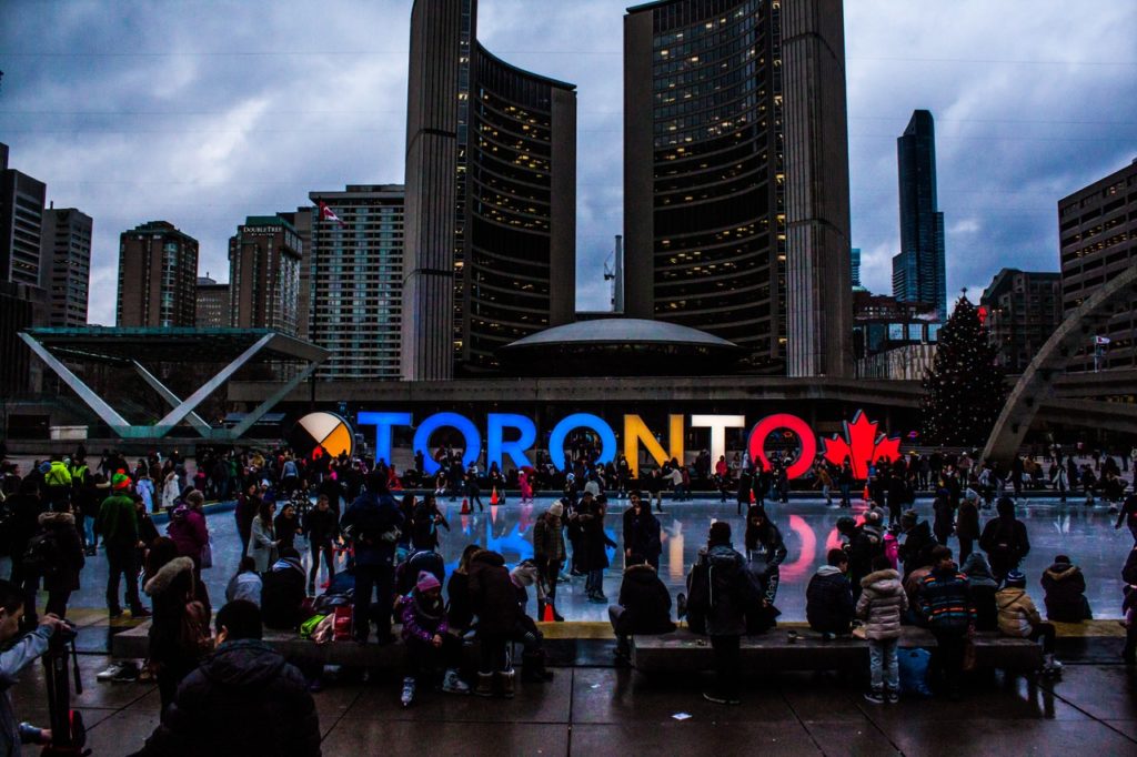 Toronto City Hall and crowds along the skating rink, showing how 2019 Forecast is optimistic.