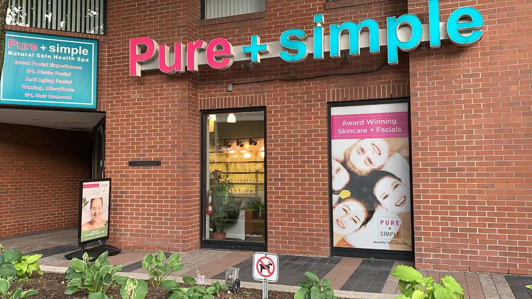 Pink blue pure + simple spa sign window posters King St W.